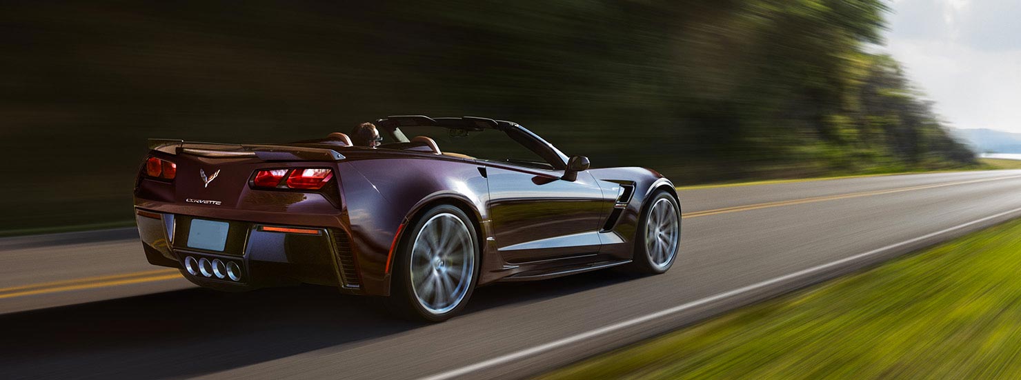 A Corvette on a country road